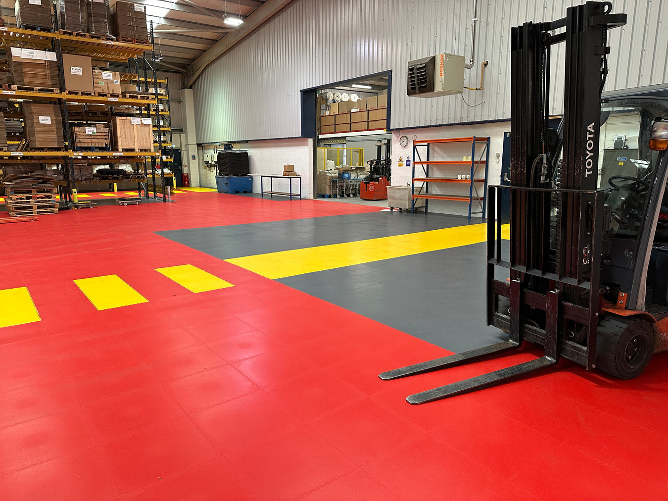 Forklift driving on Ecotile floor tiles